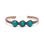 Twisted bracelet turquoise coloured stones -- 6.5cm